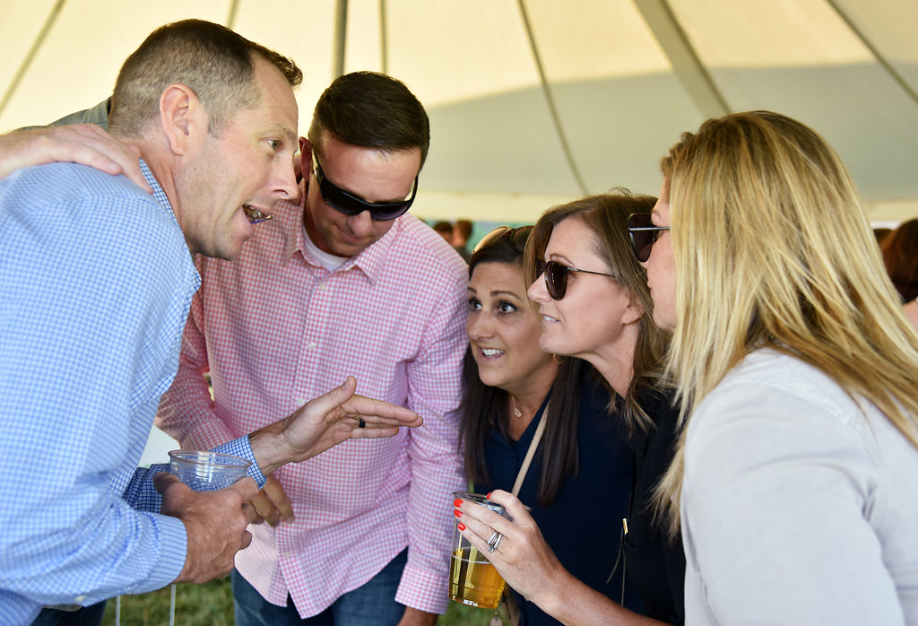 The Mike Messer Shelter Insurance team huddles together to talk about strategy in the middle of the third round of the tournament